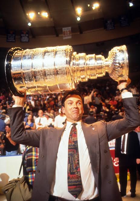 Neil Smith hoists the Stanley Cup at Madison Square Garden